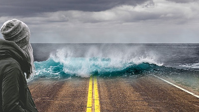 Photomontage illustrant un raz de marée causé par le réchauffement climatique