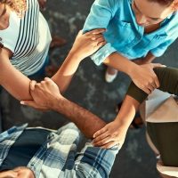 strong-group-business-people-link-hands-support-collaboration-connection-solidarity-startup-team-community-holding-arms-circle-closeup-synergy-cooperation-integrity